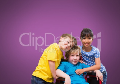 Disabled boy in wheelchair with friends with purple background
