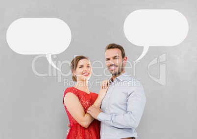 Couple with speech bubble against grey background