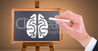Hand drawing brain on blackboard