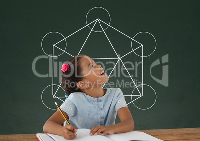 Student girl at table looking up against green blackboard with school and education graphic