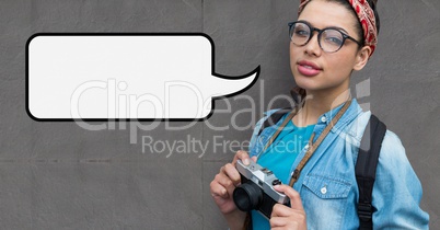 Photographer woman with speech bubble holding a camera against grey background