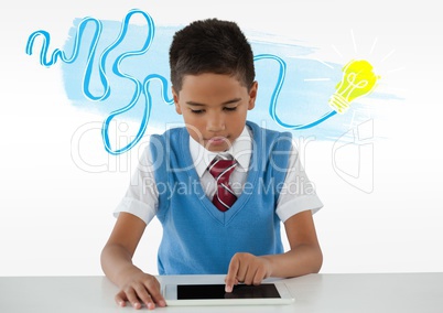 Schoolboy on tablet with colorful idea light bulb doodle