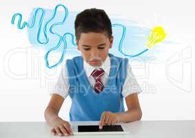 Schoolboy on tablet with colorful idea light bulb doodle