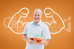 Happy student man with fists graphic standing against orange background