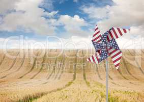 USA wind catchers in front of country crop field and sky