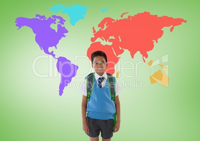 Schoolboy in front of colorful world map