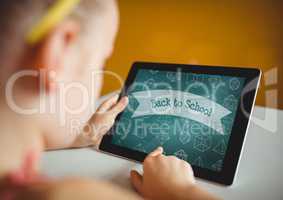 Girl holding a tablet with school icons on screen