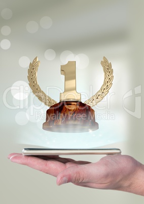 Person holding a phone with a trophy