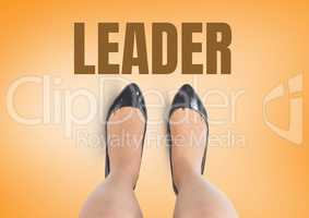 Leader text and Black shoes on feet with yellow background