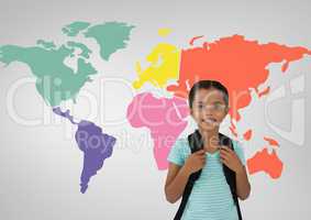 Schoolgirl in front of colorful world map