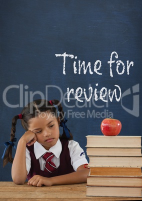 Bored student girl at table against blue blackboard with time for review text