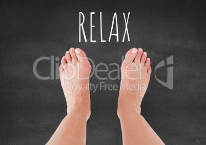 Relax text and Bare feet and grey stone background