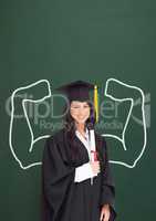 Happy graduate student woman with fists graphic standing against green blackboard