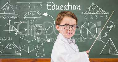 Boy teacher explaining diagrams on blackboard