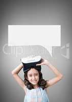 Girl with speech bubble holding a VR headset against grey background