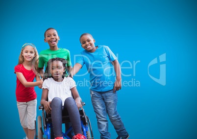 Disabled girl in wheelchair with friends and blue background