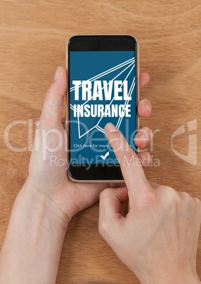 Person using a phone with travel insurance concept on screen