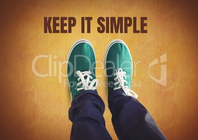 Keep it simple text and Green shoes on feet with rustic background