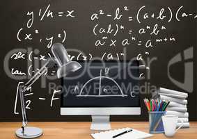 Computer Desk foreground with blackboard graphics of math equations