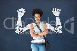 Student woman with fists graphic standing against blue blackboard