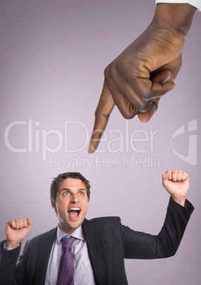 Hand pointing at excited business man against pink background