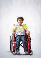 Disabled boy in wheelchair with bright background