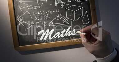 Hand writing maths and diagrams on blackboard