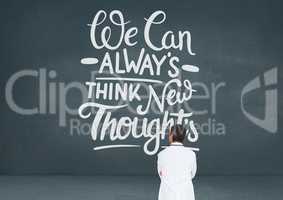 Business man standing in front of a motivational text