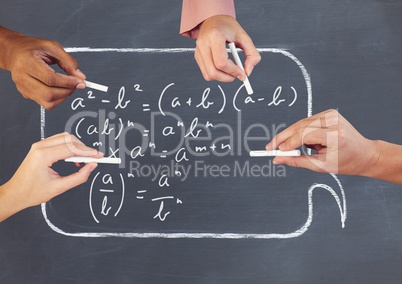 Hands writing equations on blackboard