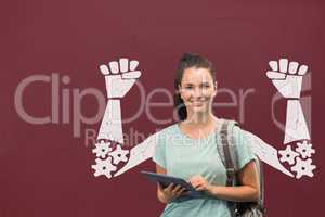 Happy student woman with fists graphic standing against red blackboard
