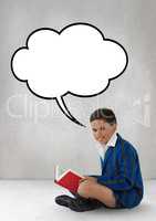 Happy boy with speech bubble reading against grey background