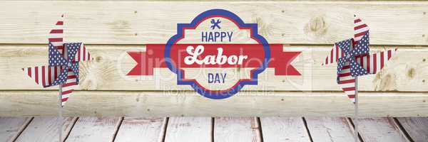 Happy labor day text and USA wind catchers in front of wood