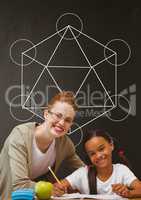 Happy student girl and teacher at table against grey blackboard with school and education graphic