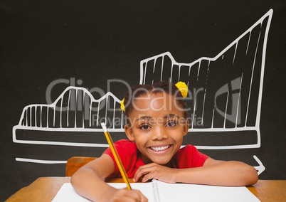 Student girl at table against grey blackboard with school and education graphic