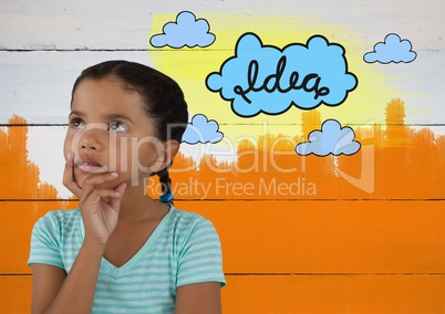 Girl looking up with colorful idea cloud graphics and painted wall