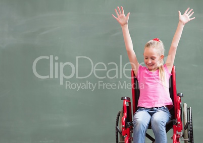 Disabled girl in wheelchair in front of blackboard