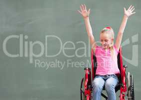 Disabled girl in wheelchair in front of blackboard