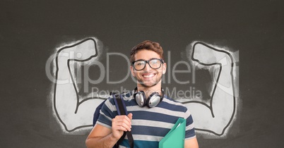 Happy student man with fists graphic standing against grey blackboard