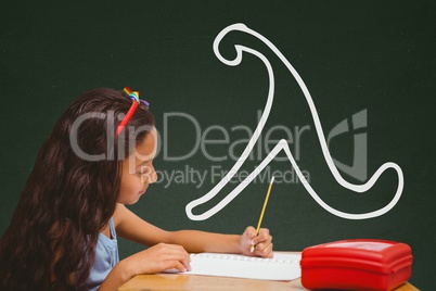 Student girl at table writing against green blackboard with school and education graphic