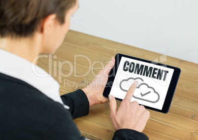 Comment text and cloud tick graphic on tablet screen with hands