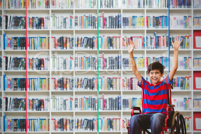 Composite image of boy in wheelchair in school corridor