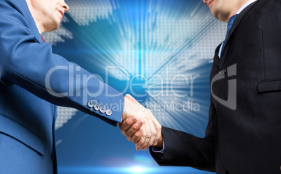 Composite image of businessman shaking hands