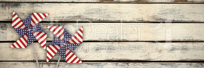 Composite image of 3d image of pinwheel toy with american flag pattern