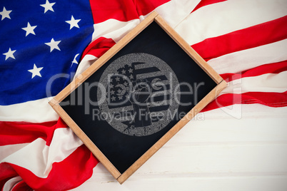 Composite image of cropped hand holding tool and american flag on red poster