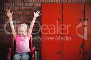Composite image of cute disabled pupil smiling in hall