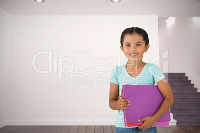 Composite image of portrait of smiling girl holding files