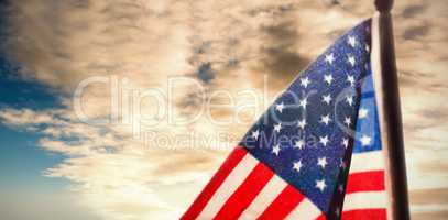 Composite image of american flag over white background