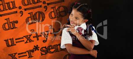 Composite image of thoughtful schoolgirl over white background