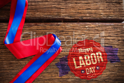 Composite image of happy labor day text in banner