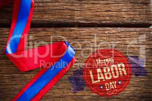 Composite image of happy labor day text in banner